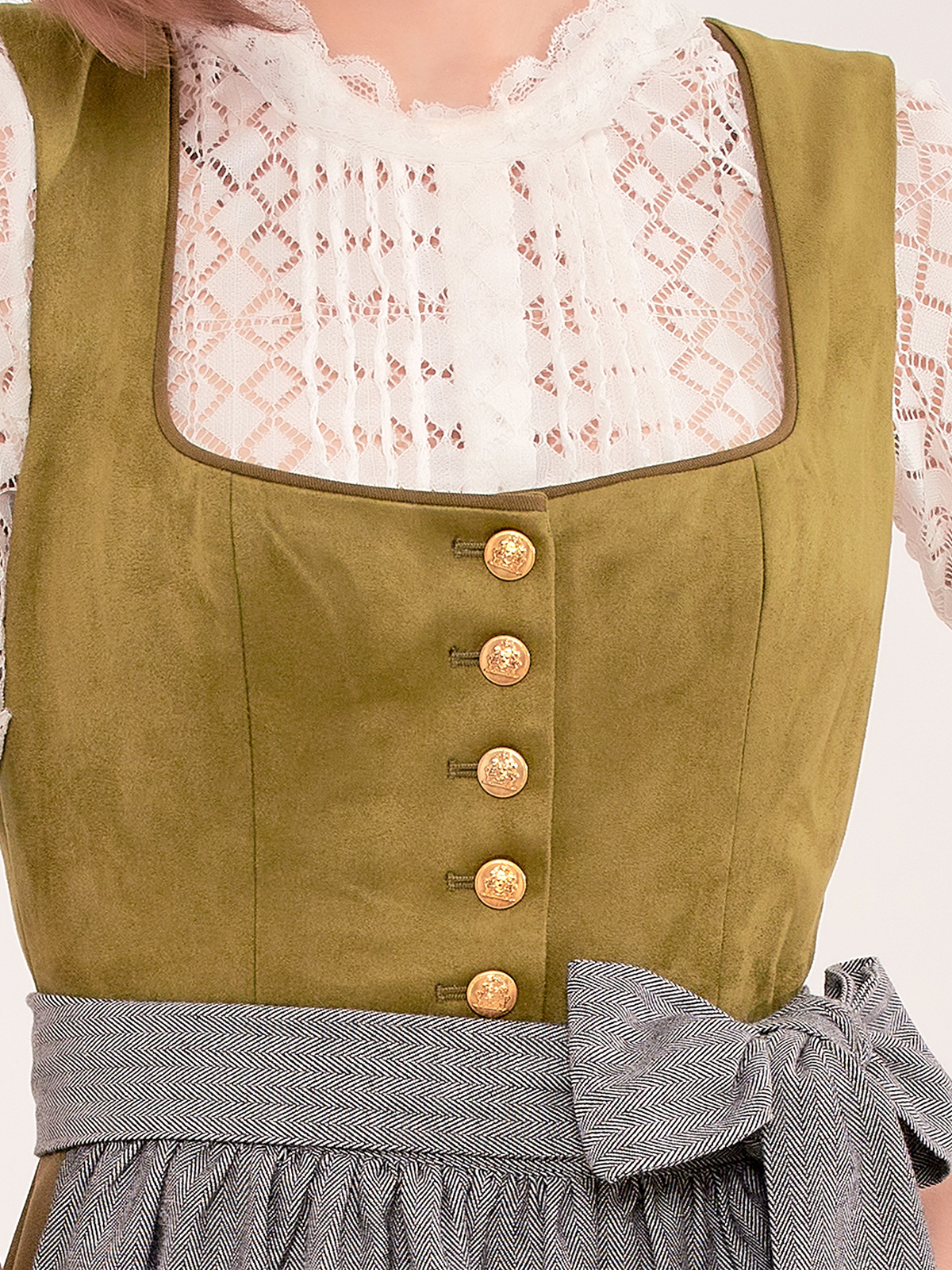 Dirndl in Grün mit floralen Details